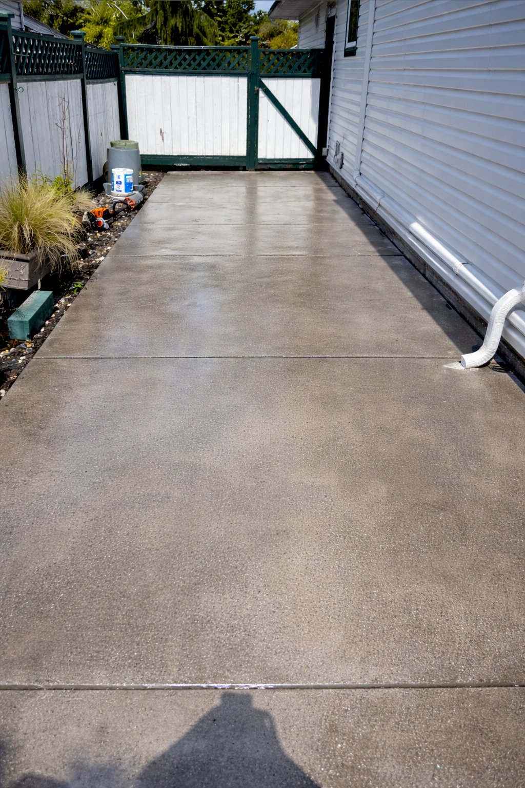 Clean concrete pad after pressure washing